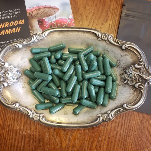 Our green capsules are a color code for 200mg of magic powder (whole mushroom form)